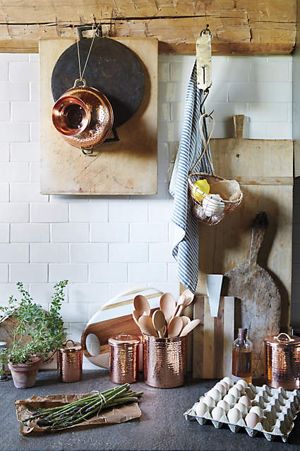 colorful bohemian kitchen furniture and decor including dinner ware and glasses from Anthropologie