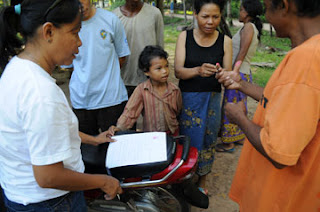 In Cambodia, a thumbprint is commonly used in leiu of a signature.  Here a thumb is painted with lipstick and a man will press it onto the paper, declaring he intends to pay back the money he is being given.