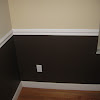 Wall Chair Rail - Top 70 Best Chair Rail Ideas - Molding Trim Interior Designs - Have an assistant help hold the chair rail at the marked height.