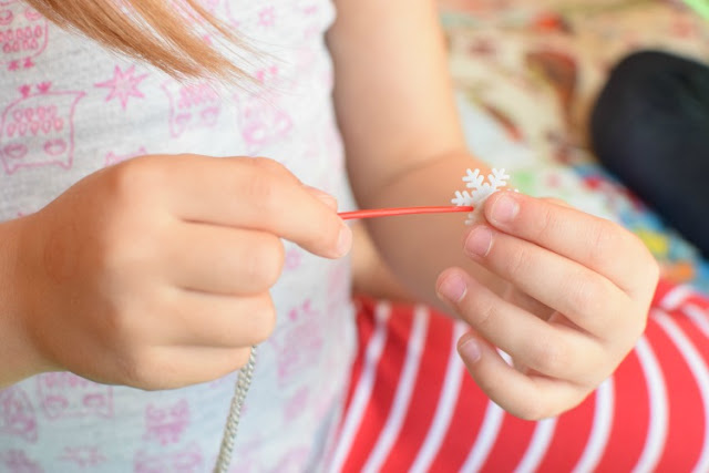 Christmas Fine Motor Button Sewing Activity. Preschoolers, kindergartners, and elementary kids will enjoying making a cheery Christmas tree while developing fine motor skills! Easy prep!