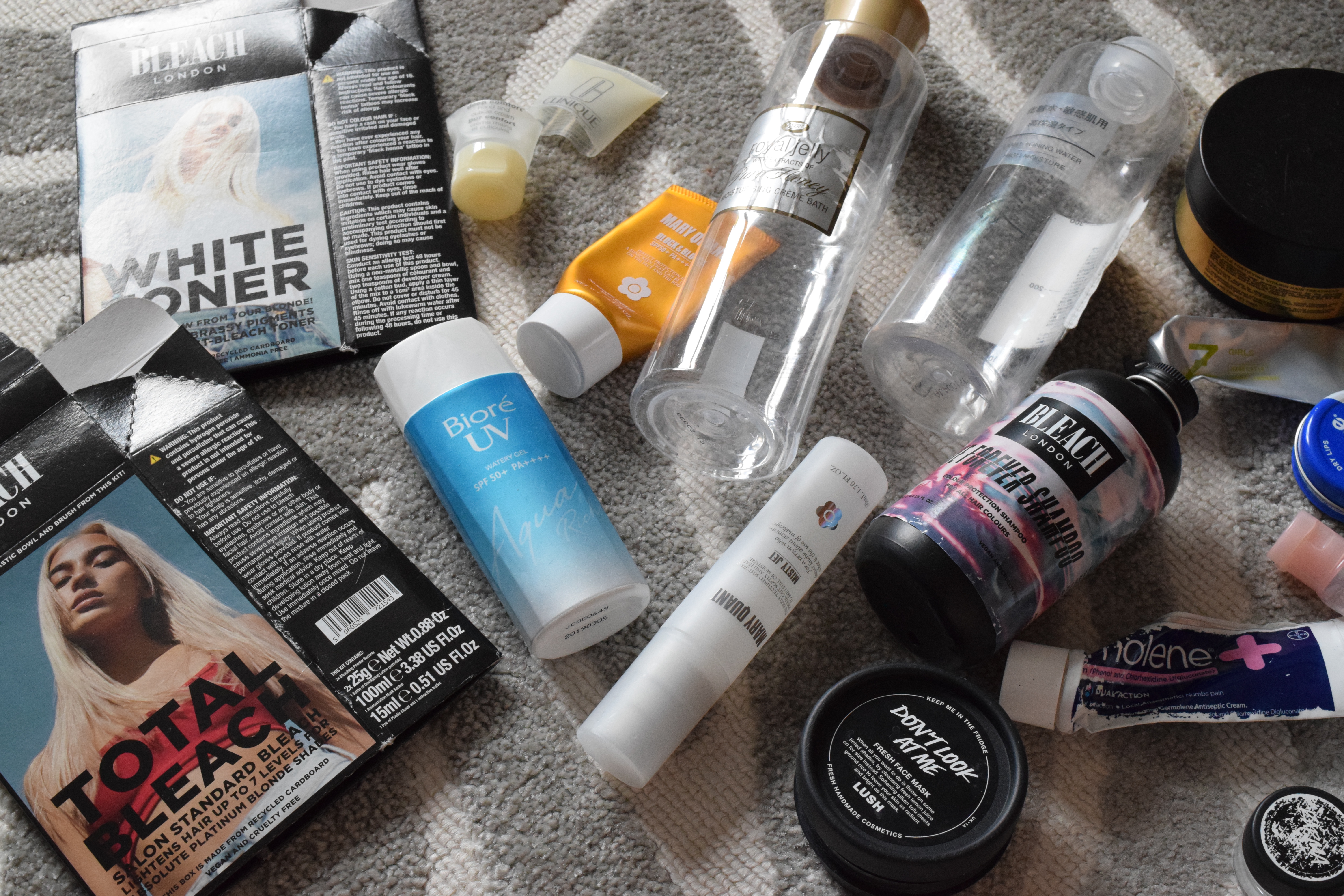 Empty products from brands including Clinique, Mary Quant, Bleach London and Lush