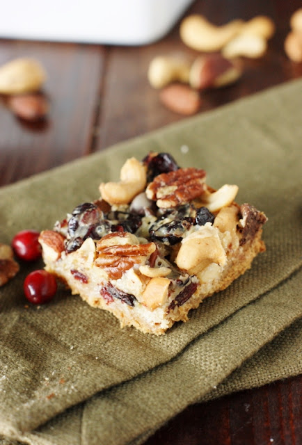 Mixed Nuts & Cranberry Magic Bars ~ perfect for celebrating the holiday season ... or a random Tuesday! Enjoy for snacks, parties, cookie trays, and holiday gift-giving, too.   www.thekitchenismyplayground.com