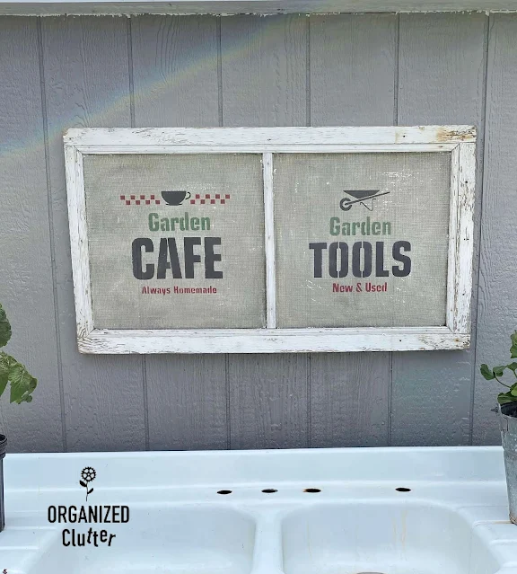 Photo of window screen garden sign