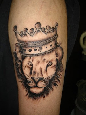 lion tattoo and crown tattoo