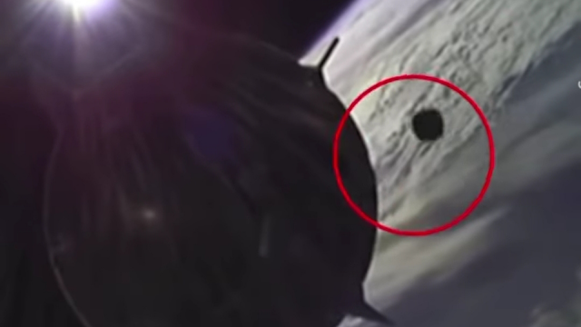 UFO evidence caught on camera flying past the SpaceX capsule.