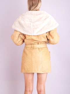 Vintage 1980's Tan shearling coat with large collar and belted tie front closure.
