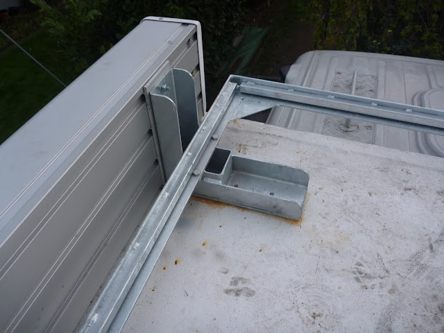 20mm box section rails welded to roof rack frame on which the decking boards sit