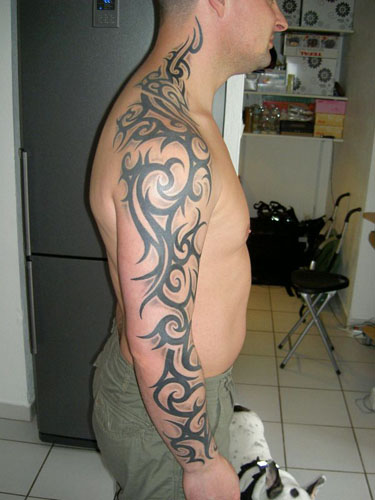 tribal tattoos on shoulder and chest. Labels: Arm Tribal Tattoo