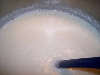 Cooking the milk.