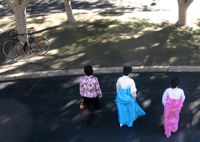 These ladies were off to a wedding reception in traditional Korean dress