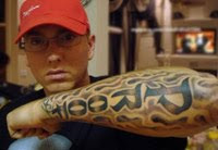 Eminem's left arm tattoo