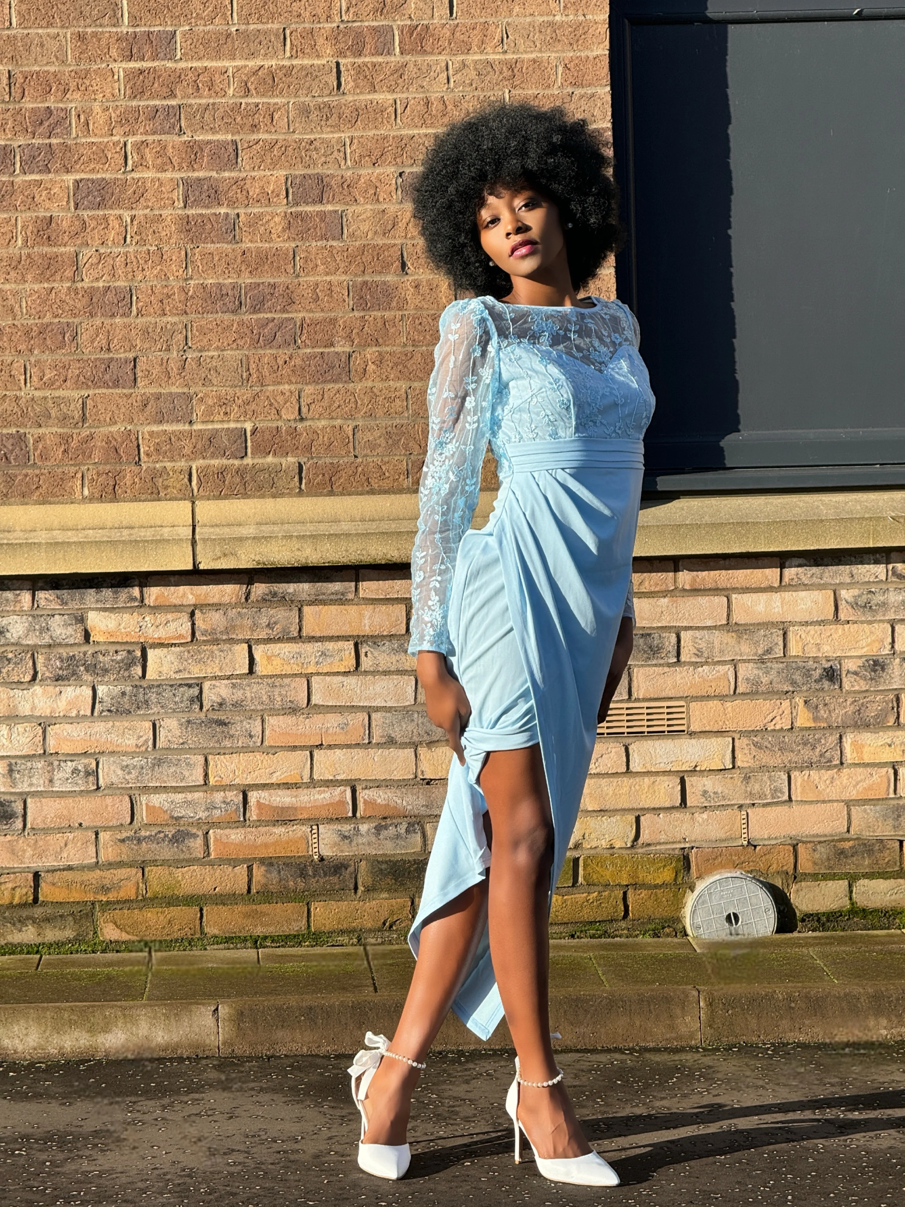 Close-up of Lace Light Blue Long Sleeve Dress detailing delicate lace sleeves.