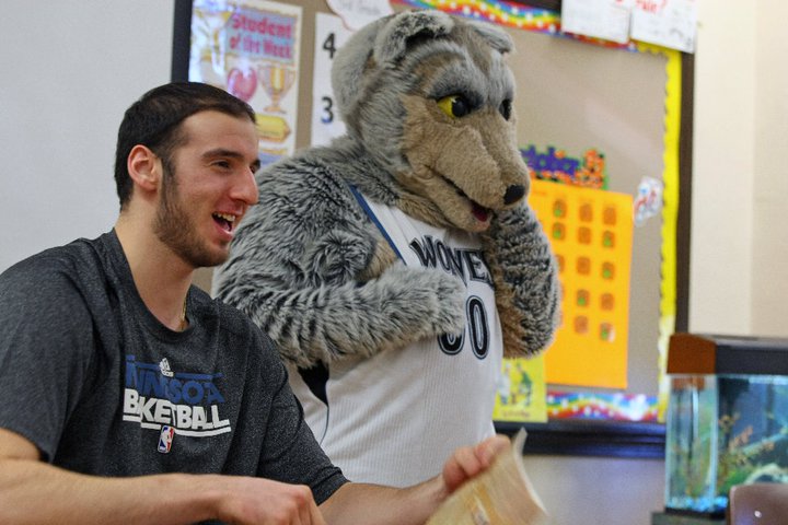 Kosta Koufos & the Timberwolves Mascot at a local elementary school)