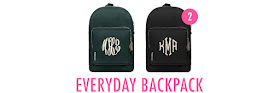 green and black monogrammed backpacks