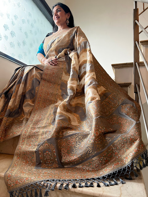 A Tale of Timeless Elegance: The Silver Grey and White Mushroo Satin Silk Saree