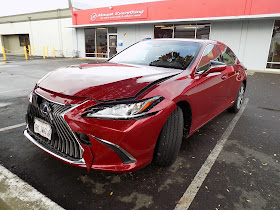 2019 Lexus ES300h with damaged bumper & hood at Almost Everything Auto Body.