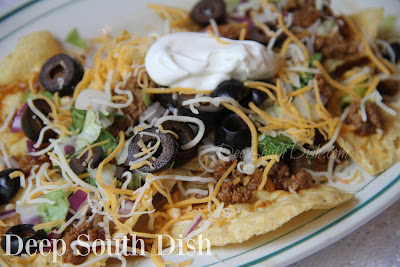 Nachos on a platter made with Tex-Mex American-Style Taco Meat