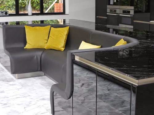 Modern Kitchen Design with built-in sofa by The Myers Touch