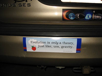 funny car stickers. a car with a Darwinfish,