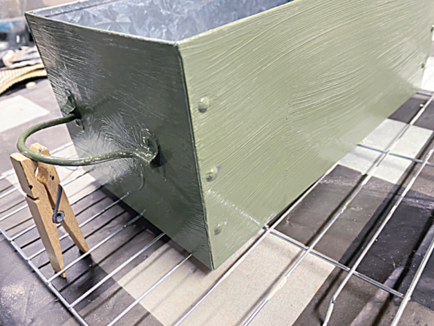 galvanized crate with green paint