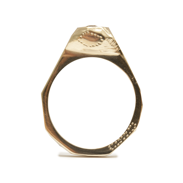 It is made from 18ct yellow gold and a chocolate diamond 