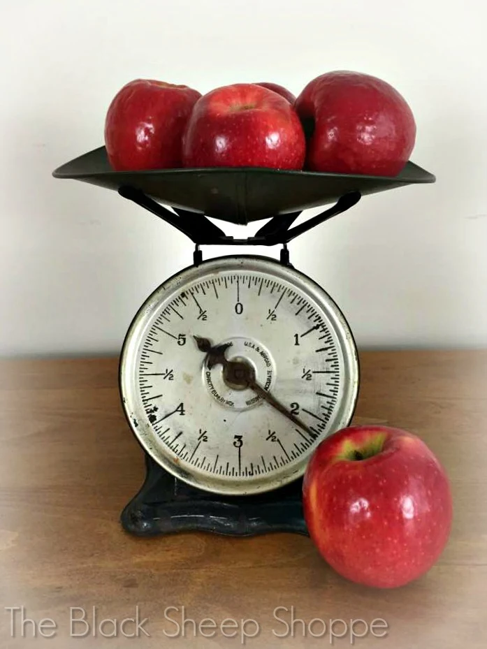 Vintage Bay City Hardware Company Scale with apples.