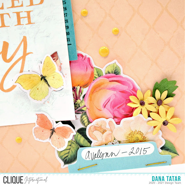 How to Build Layers on a Spring Scrapbook Layout Using Die-Cut Flowers and Butterflies