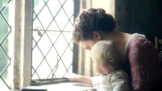 Elizabeth Poldark playing with baby Geoffrey Charles by the Trenwith window