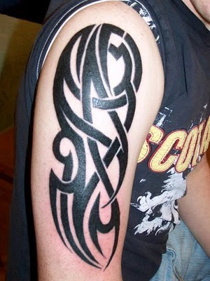 complex tribal arm tattoo