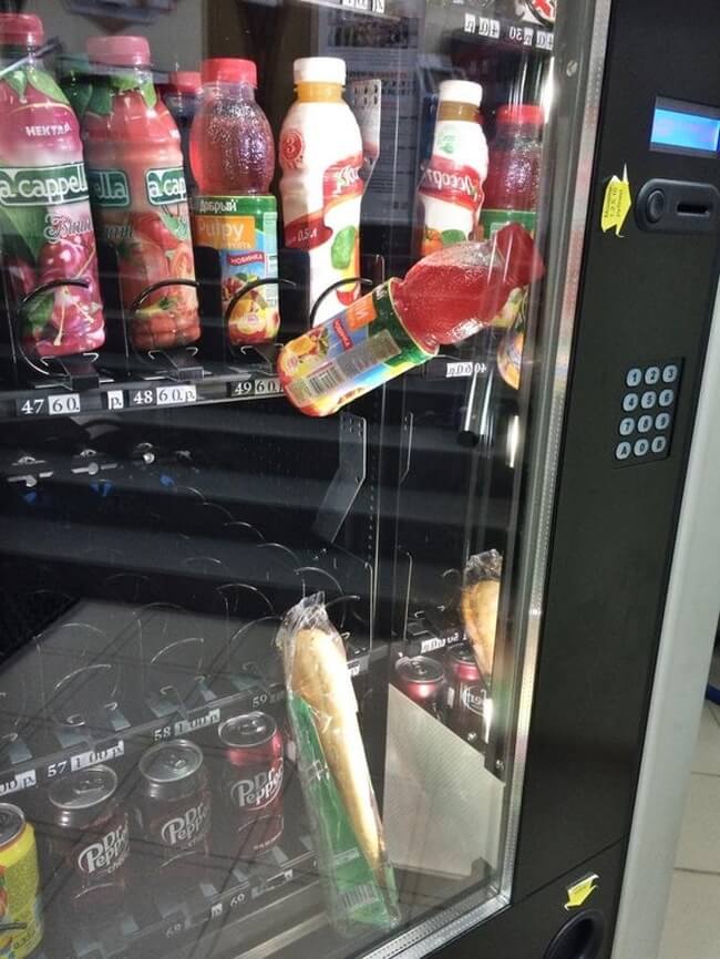 26 Times Life Went Unbelievably Wrong - His sandwich got stuck in the vending machine, so he bought a drink to push the sandwich down. Here is the epic result.