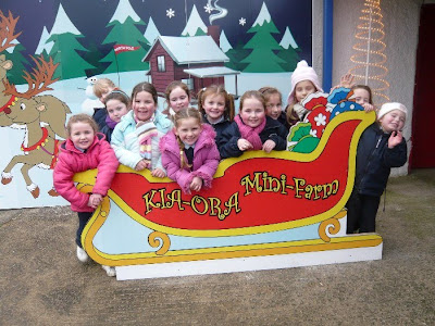 kids celebrating christmas in their school