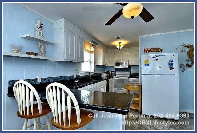 This 3 bedroom oceanfront home for sale in Carova NC also features a beautiful kitchen that comes with plenty of cabinets and shelves. 