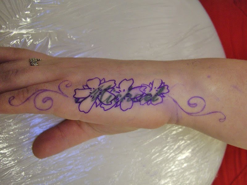 Cover Up Tattoo On Hand Name to Floral Cover Up Tattoo On Hand Name to Floral