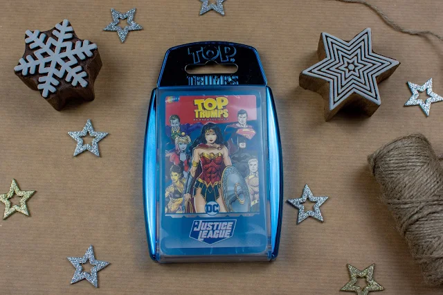 A Top Trump box in metallic blue with a set of DC Comics' Justice League Top Trump cards in