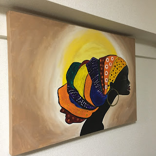 a black woman and the sun painting