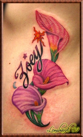 Lily flower rib piece tattoo. black calla lily tattoo