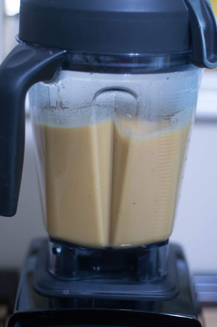 The cheese sauce blending in the blender. 