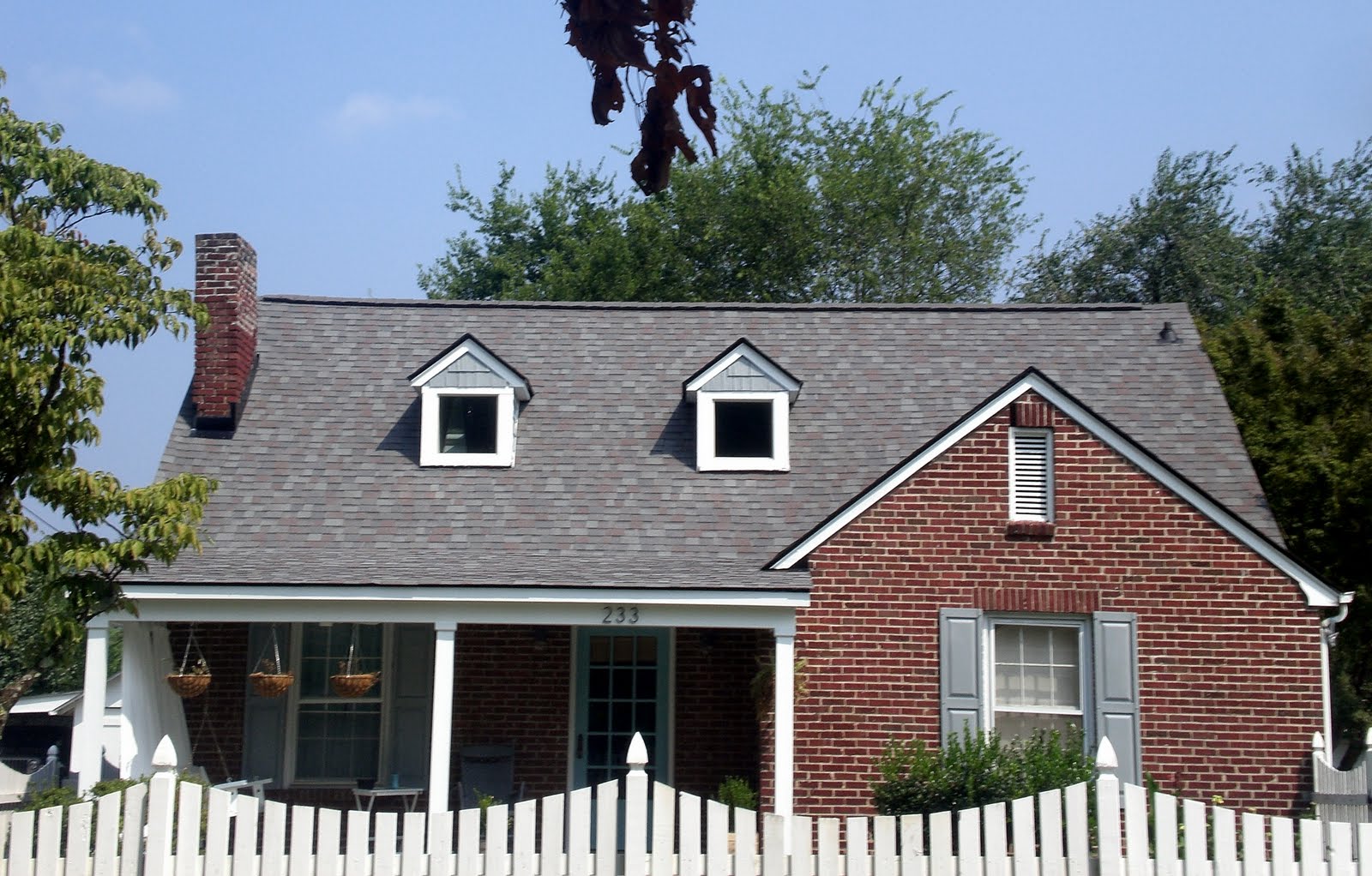 Red Brick House with Colonial Slate Roof