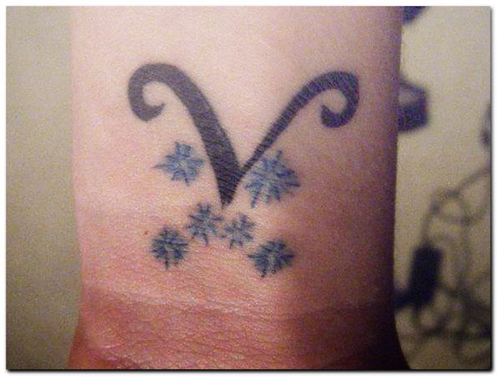 Aries Zodiac Tattoos: Aries Zodiac Tattoos aries tattoo designs symbol featuring the ram can range from natural — a