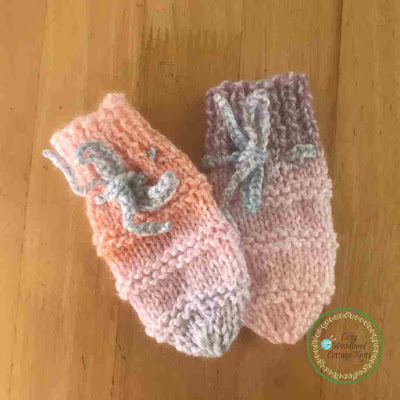Picture of hand knitted baby mittens