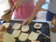 Peanut butter sandwiches, being made on sliced bread baked at the bakery.