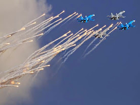Sukhoi Su-27 Flanker Among Fire Flare