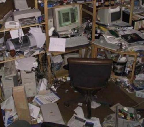 Messy office shows objects on