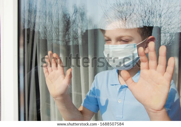 https://www.shutterstock.com/id/image-photo/covid19-pandemic-coronavirus-isolation-boy-face-1688507584