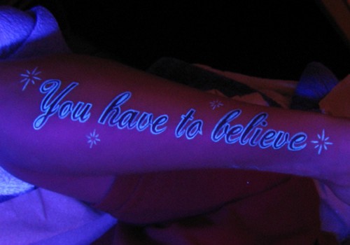 Labels blacklight forearm tattoos text 