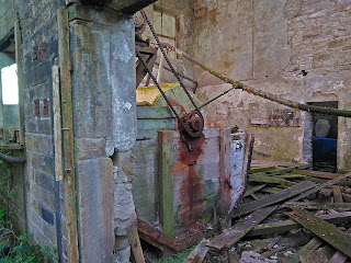 <img src="Wardle Tannery.jpeg" alt=" image of the entrance to the  derelict mill in wardle" />