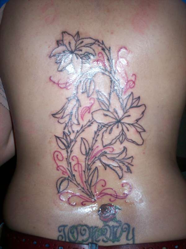 flower tattoo drawings. Lily flower tattoo designs can