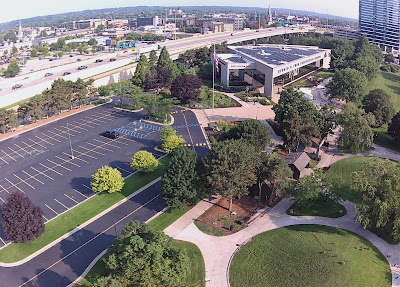90 feet up to show US-131, Ford Presidential Museum, and Indian mound park in forground