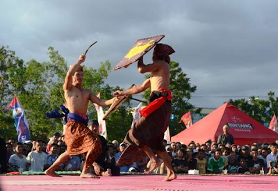 Peresean is a unsafe sport that has conk a  Fights Cane Culture inwards Lombok