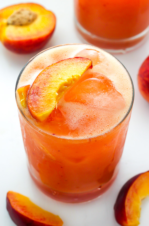 Fun and fruity Fresh Peach Margaritas!!! Made with fresh peach puree, orange juice, and lime juice. They’re so refreshing and the perfect Summer cocktail!